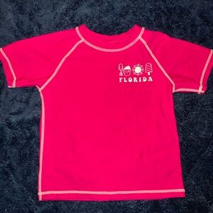 Girls pink rash guard swim shirt